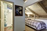 Loft bathroom and twin bed